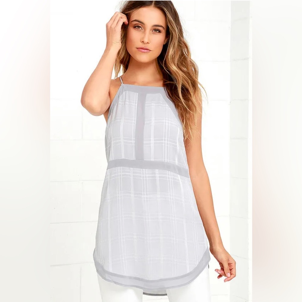 Doe & Rae light grey tunic dress or top with an apron neckline and rounded hem.
